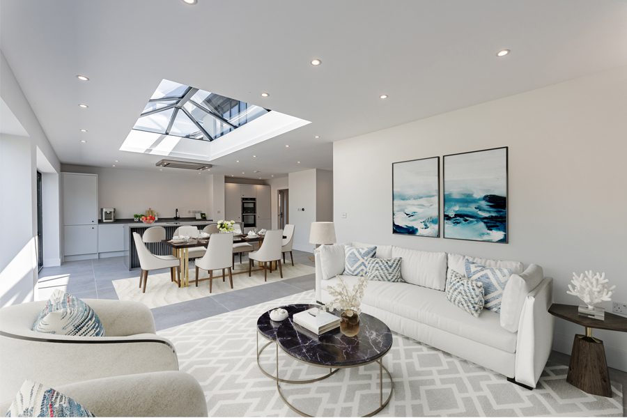 Open-plan family living room with kitchen and dining space in a modern Hartford property