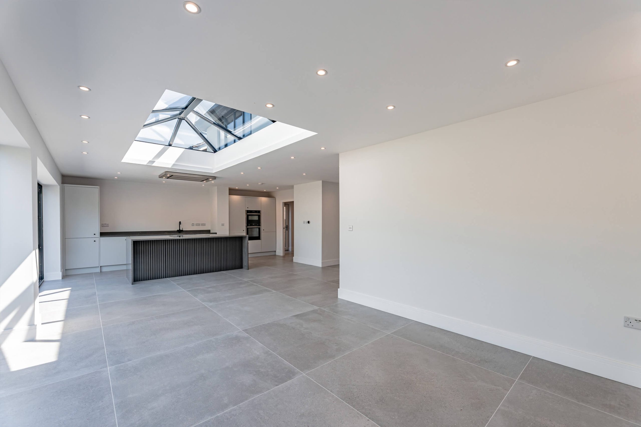 Empty Cheshire kitchen before virtual staging, showing space potential.