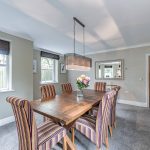 Bespoke modern home in Northwich with contemporary dining space and pendant lighting.