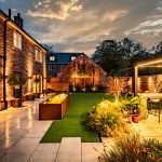 Contemporary landscaped garden at 4 Bell Crescent, property for sale in Davenham water feature, mood lighting and outdoor dining space.
