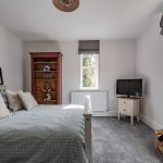 High-specification property in Northwich with contemporary study space and large window offering garden views