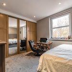 High-specification property in Northwich with contemporary study space and large window offering garden views.