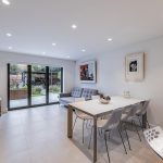 Modern dining kitchen with dual aspect light and integrated Siemens appliances in a Davenham Cheshire home.