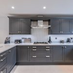 Contemporary Shaker kitchen with stainless-steel hob and hood, white quartz worktops at 4 Bell Crescent, Davenham.