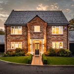 Twilight view of 4 Bell Crescent, Davenham, Cheshire highlighting architectural lighting and evening ambience