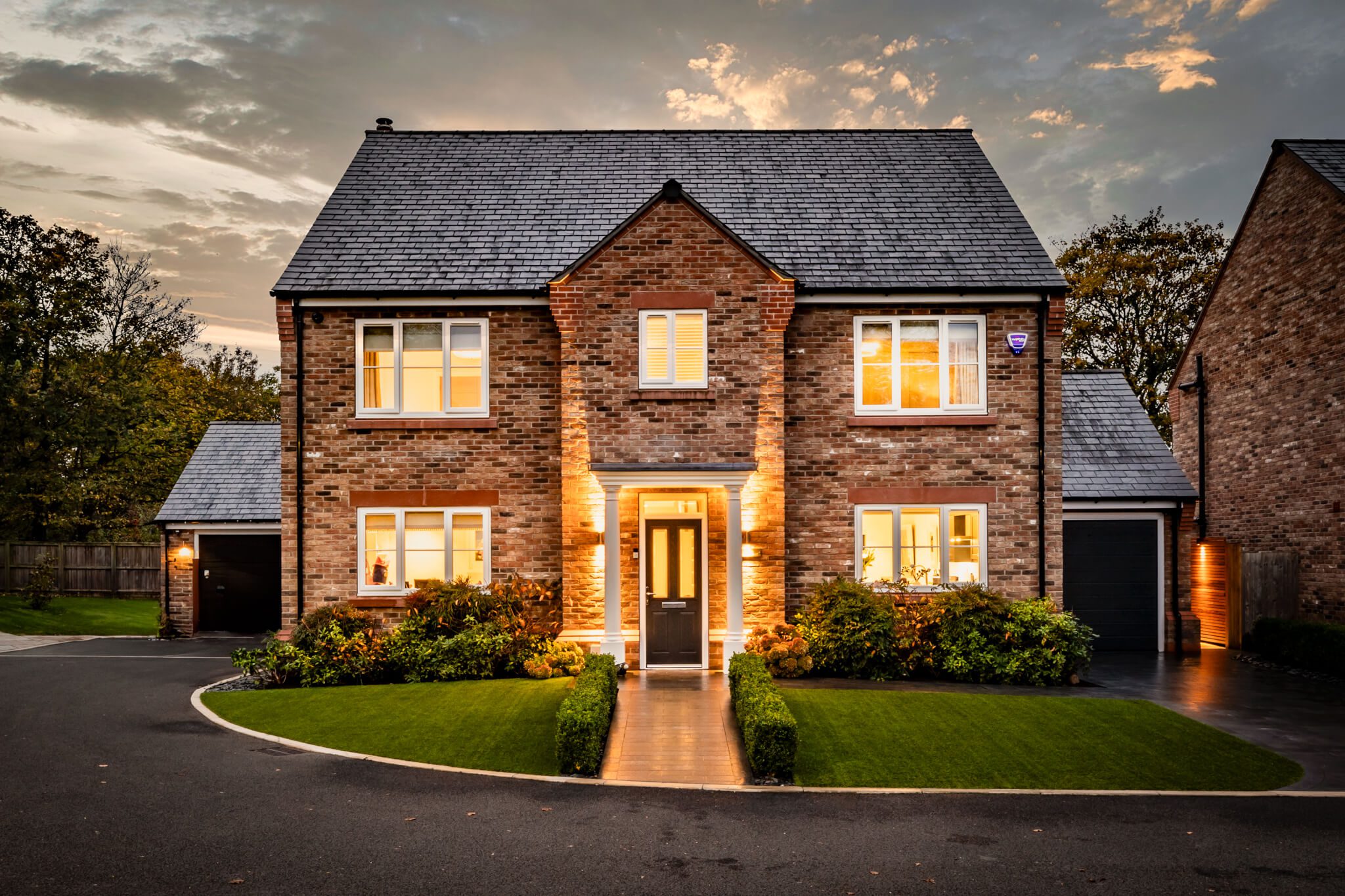 Twilight view of 4 Bell Crescent, Davenham, Cheshire highlighting architectural lighting and evening ambience