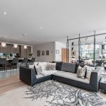Bespoke kitchen design with integrated Miele appliances, sleek cabinetry and large central work island.