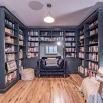 Bespoke library and study area at a detached home on Church Street, Davenham with floor to ceiling fitted bookcases and timber flooring