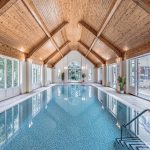 Heated indoor swimming pool with vaulted timber ceiling at 3 The Woodlands, Hartford, Cheshire.