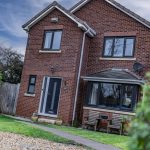Detached house front elevation with driveway at 24 Priory Avenue, Leftwich