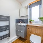 Contemporary en suite bathroom with vanity unit at 24 Priory Avenue, Leftwich