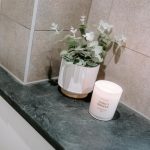 Detail of modern family bathroom tiling and vanity area at 24 Priory Avenue, Leftwich