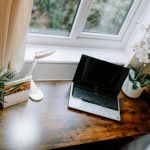 Home office or study space laptop detail with desk and window at 24 Priory Avenue, Leftwich