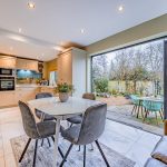 Open plan kitchen dining room with bifold doors at 24 Priory Avenue, Leftwich