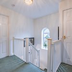 First floor landing with arched feature window at 24 Priory Avenue, Leftwich