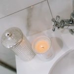 Bathroom sink detail with chrome tap and styled accessories at 46 Hodge Lane Hartford