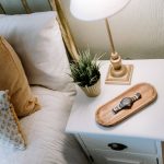 Bedside table styling with lamp and accessories in bedroom at 46 Hodge Lane Hartford