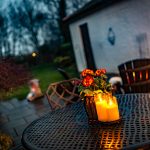 Garden table with candle lighting and outdoor seating at 46 Hodge Lane Hartford