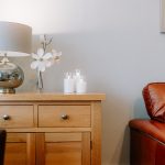 Lounge side table with lamp and decorative styling at 46 Hodge Lane Hartford
