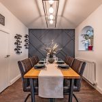 Dining room with feature wall at Orchard House Common Lane Lach Dennis Cheshire