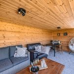 Garden room interior with seating and relaxed lifestyle space in Davenham home