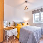 Double bedroom with fitted wardrobes in a Northwich property on Runcorn Road