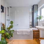 Family bathroom with bath and shower in a detached home on Runcorn Road, Northwich