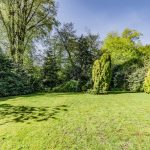 Spacious rear garden at The Beeches, Royal Gardens, Davenham with lawn and established boundaries.