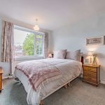 Additional double bedroom within this four-bedroom detached home in Davenham, enjoying natural light and a peaceful outlook