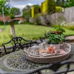 Patio and garden lifestyle setting within this detached home in Davenham, designed to capture the outdoor space and everyday enjoyment of the garden.