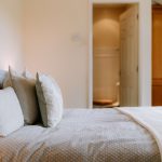Styled detail image capturing the principal bedroom within this detached four-bedroom home in Davenham