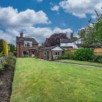 Rear elevation of this four-bedroom detached property in Davenham, highlighting the generous garden and landscaped outdoor space.