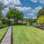 Established rear garden serving this four-bedroom detached home in Davenham, featuring mature planting, lawned areas and a private outdoor setting.