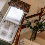 Interior staircase detail within this detached family home in Davenham, highlighting architectural features and styling elements.