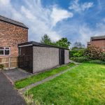 Detached garage beside enclosed rear garden at Eaton Lane Davenham