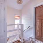 First floor landing with original style doors and natural light