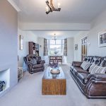 Through lounge with dual aspect layout and dining space