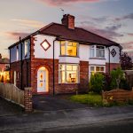 Traditional semi-detached home in Davenham photographed at twilight