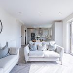 Dining area overlooking kitchen in open plan family space