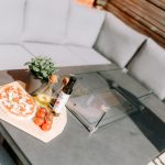 Garden seating area with pizza oven and outdoor cooking setup at detached home in Hartford