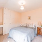 Bedroom at Little Grebe Cottage, Billinge Green featuring fitted wardrobes and dressing area