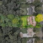 Overhead aerial view of detached Chester Road property with extensive gardens backing onto woodland