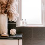 Bathroom styling detail at 211 Hartford Road, Davenham, with vase, candle and decorative accessories beside the window.