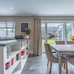 Open plan kitchen and dining area at 39 Albemarle Avenue, Hartford, with French doors opening to the rear garden.