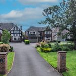 Private gated approach on Albemarle Avenue, Hartford, showing the exclusive setting of 39 Albemarle Avenue and neighbouring detached homes.