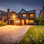 Twilight front elevation of this beautifully presented detached family home in one of Kingsmead's most desirable locations.