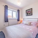 Well-presented second bedroom with fitted wardrobes at 9 Hartshill Close, Northwich.