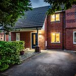 Evening exterior showcasing the attractive frontage and driveway at 9 Harthill Close, Kingsmead.
