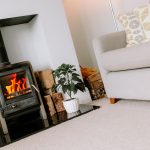 Contemporary log-burning stove creating a cosy focal point within the elegant lounge at 219 Hartford Road, Davenham.