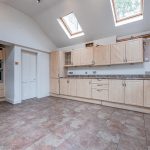 Generously proportioned kitchen with rooflights at The Hollies, a four-bedroom detached home in Moulton, Cheshire.